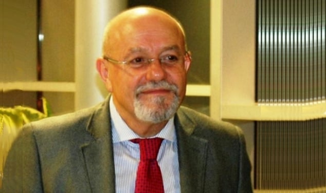 Image of Maurizio Pozzi general practitioner with red tie and glasses