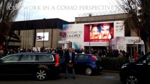 Lorenzo Domini sullo sfondo di Bologna Fiere e manifesto Cosmoprof